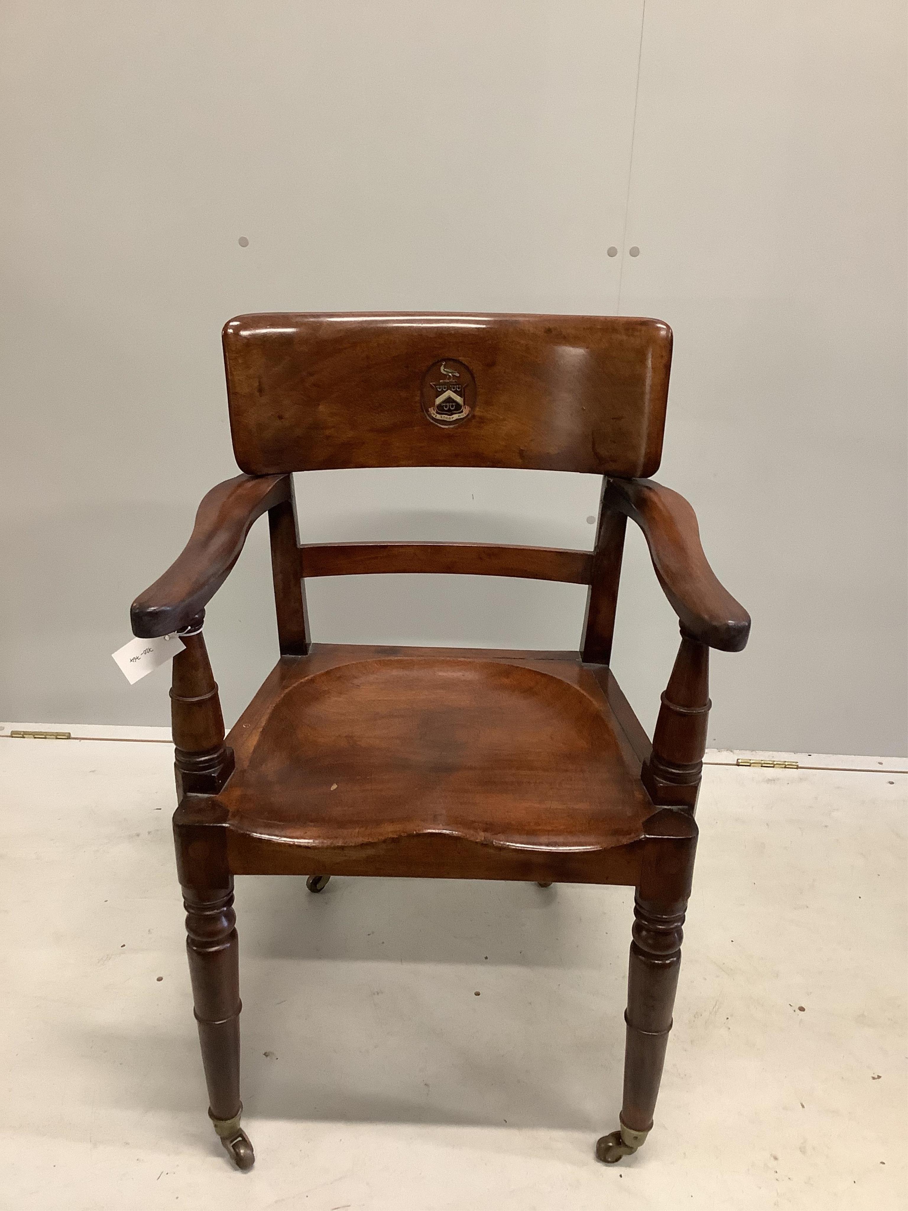 An early 19th century mahogany hall chair with painted armorial and motto 'We Stoop Not', with a Victorian beadwork cushion, width 56cm, depth 42cm, height 88cm. Condition - good